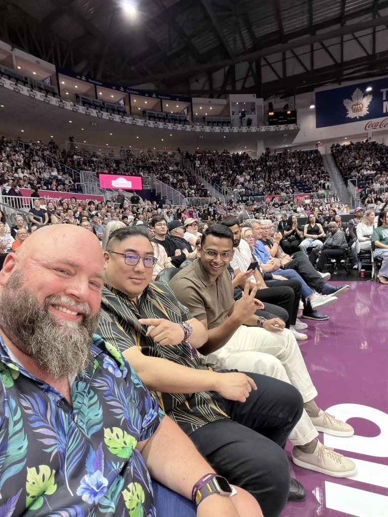 HawaiianShirtGuy with fans courtside at Toronto Tempo