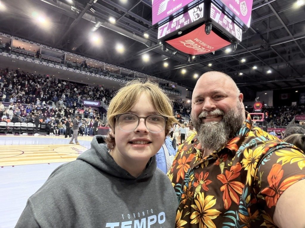 HawaiianShirtGuy with his kid at the Toronto Tempo arena